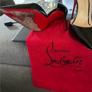 Christian Louboutin Black Patent Pumps with Red Soles 8m brought from Saks  .
